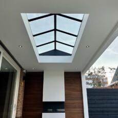 Serredak van gelaagd glas